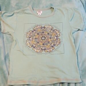 Tank top flower pattern greenish bluish color the bran is BDG